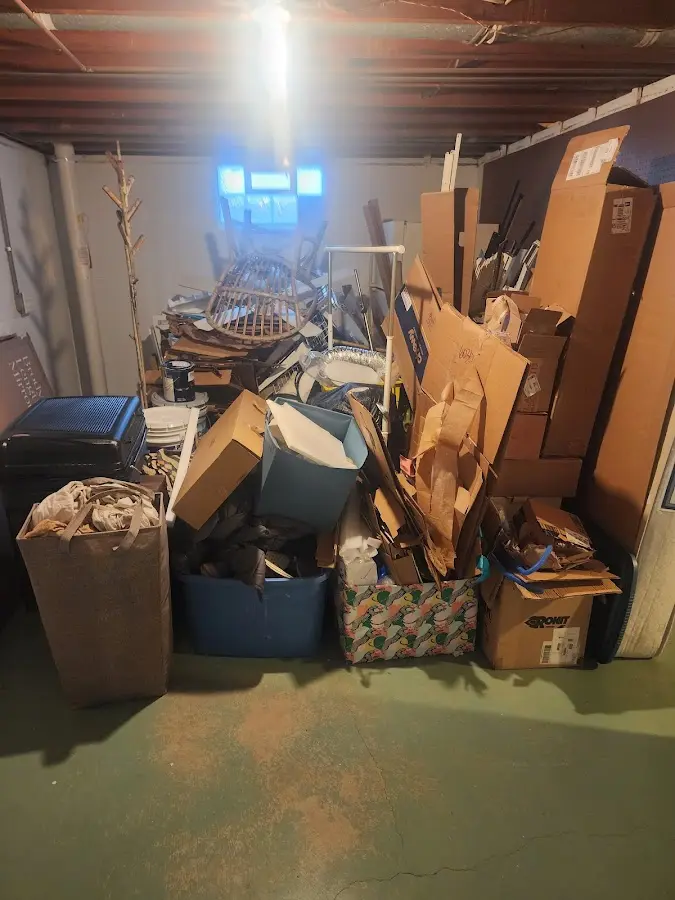 Roll-off dumpster container at job site for 2 Yard Dumpster Rental in Salina